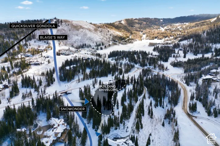 Snowy aerial view with a mountain view