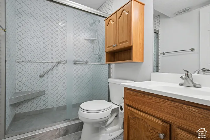 Basement bathroom with oversized walk in shower.