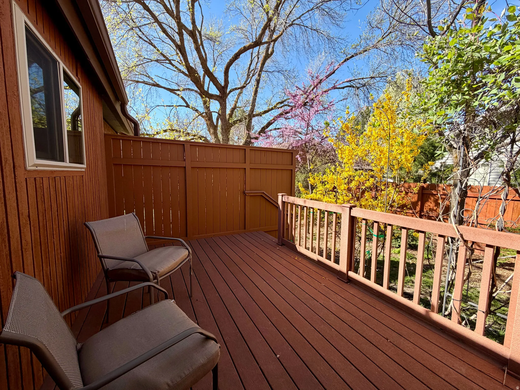 View of private deck and back yard