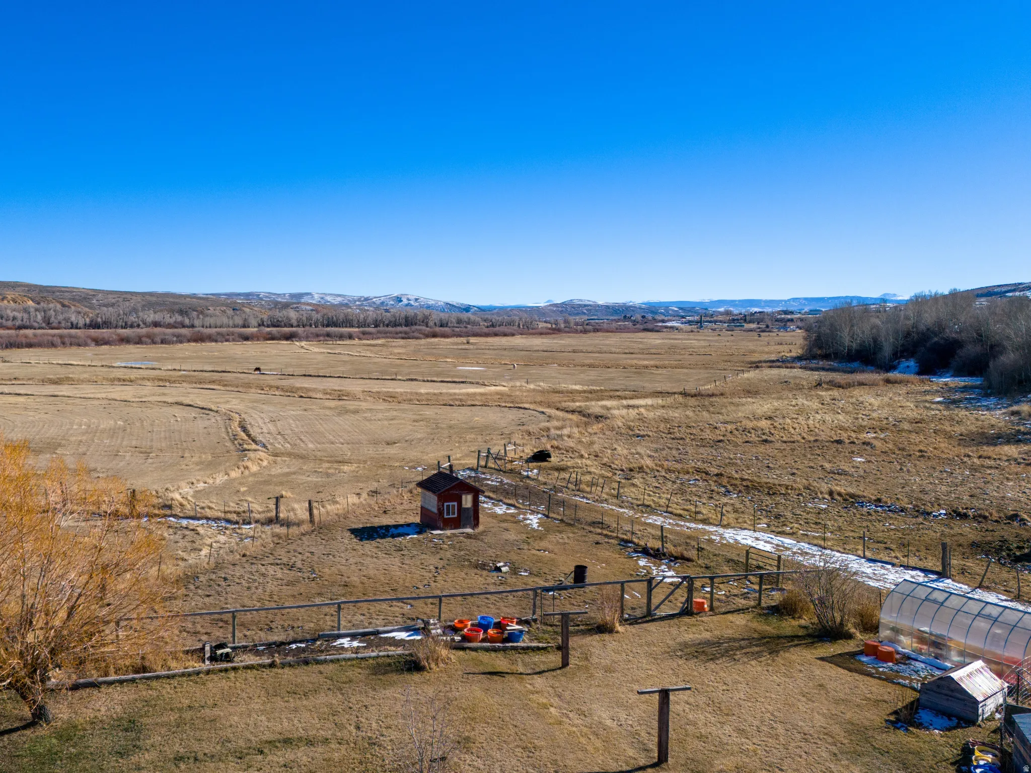Overview of rural landscape with a mountainous background