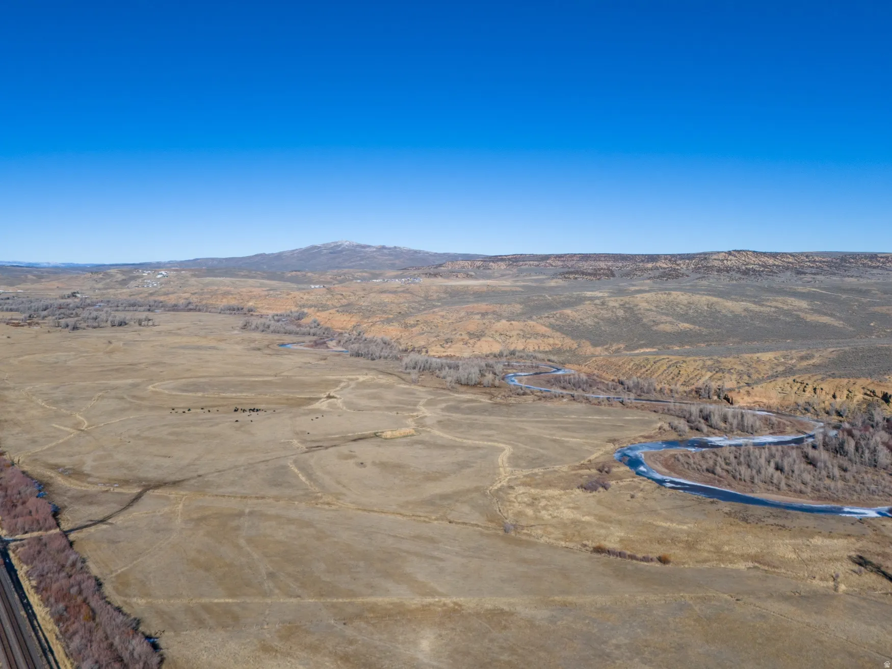 View of rural area with a mountain backdrop