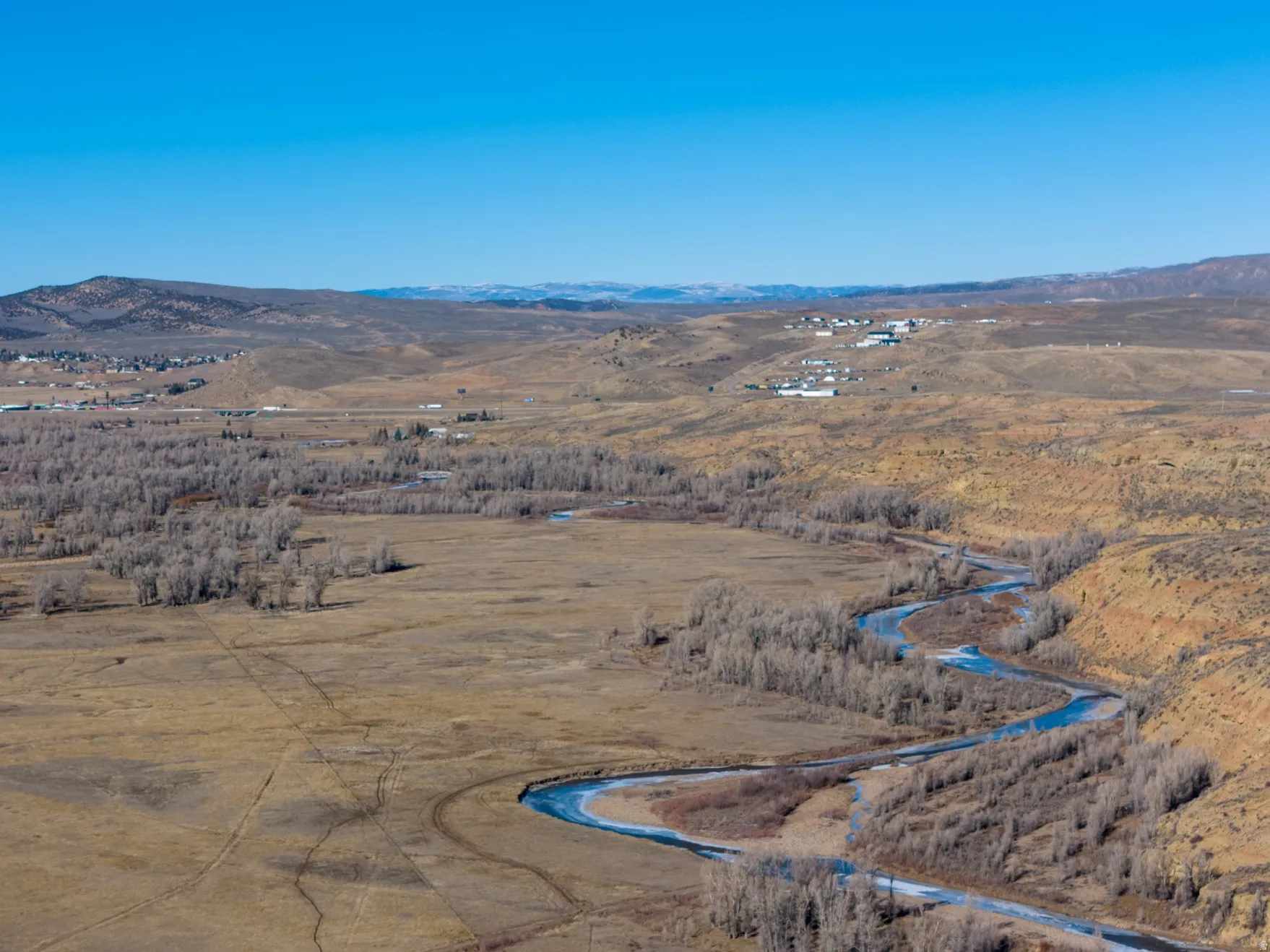 View of rural area with a mountainous background and property parcel outlined