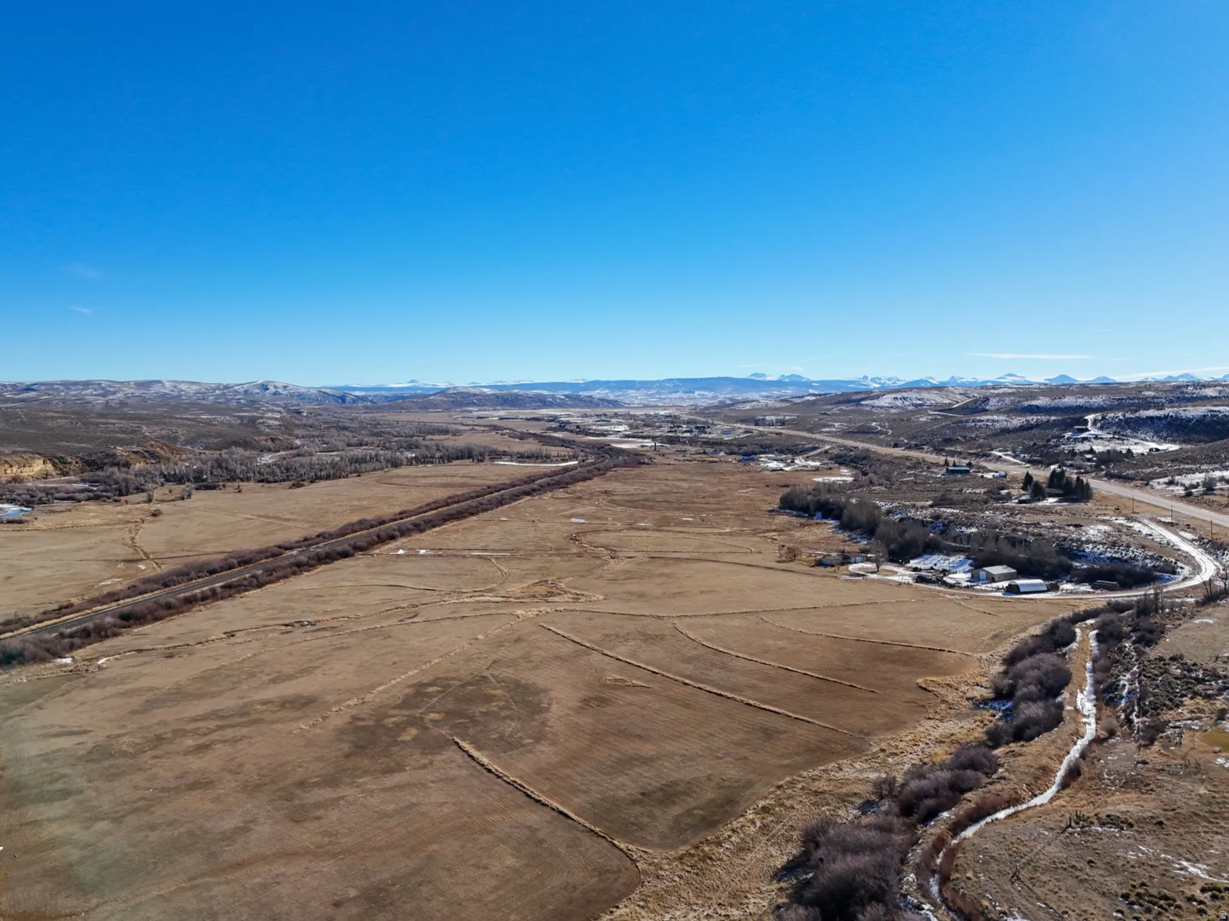 View of rural area with a mountain backdrop
