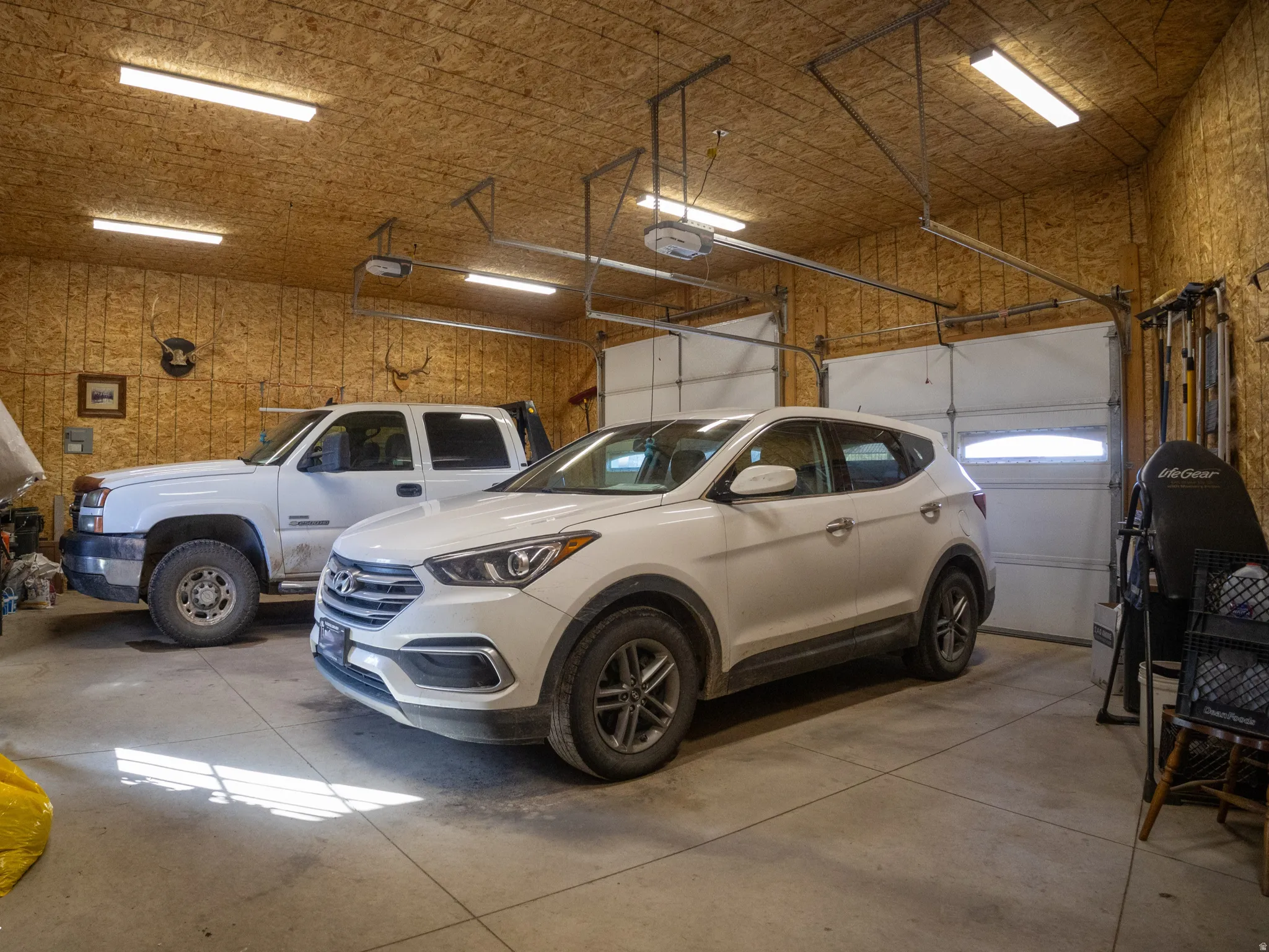 Garage featuring a garage door opener