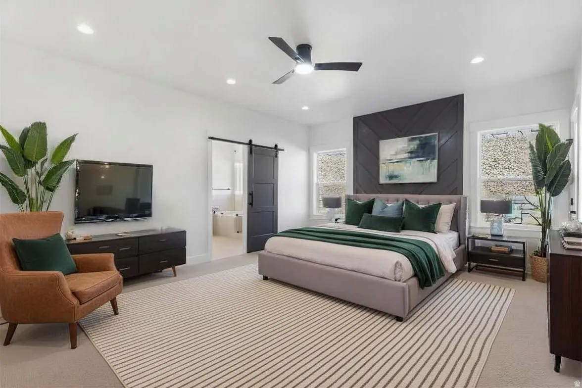 Enhanced photo of the staged primary suite