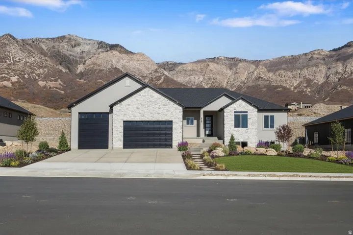 Enhanced photo of exterior with artist rendition of landscape (Not included)