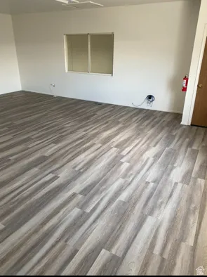 Empty room with wood finished floors