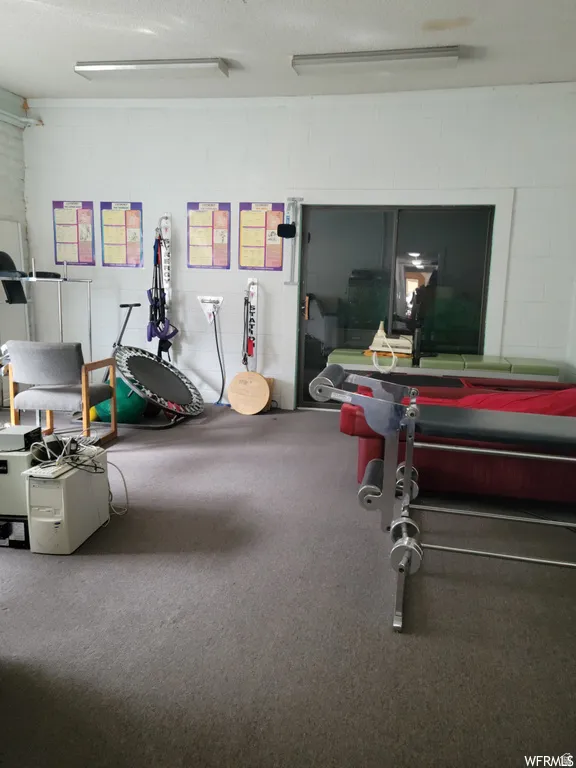 Recreation room with a textured ceiling