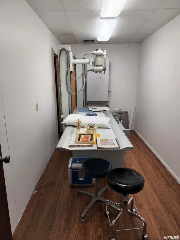 Home office featuring a drop ceiling