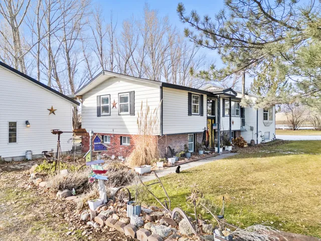 View of front of home featuring a front lawn