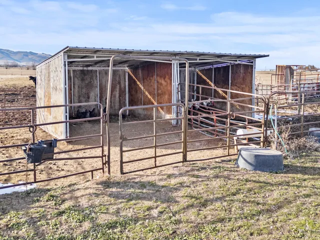 View of outbuilding featuring an exterior structure and a view of rural / pastoral area