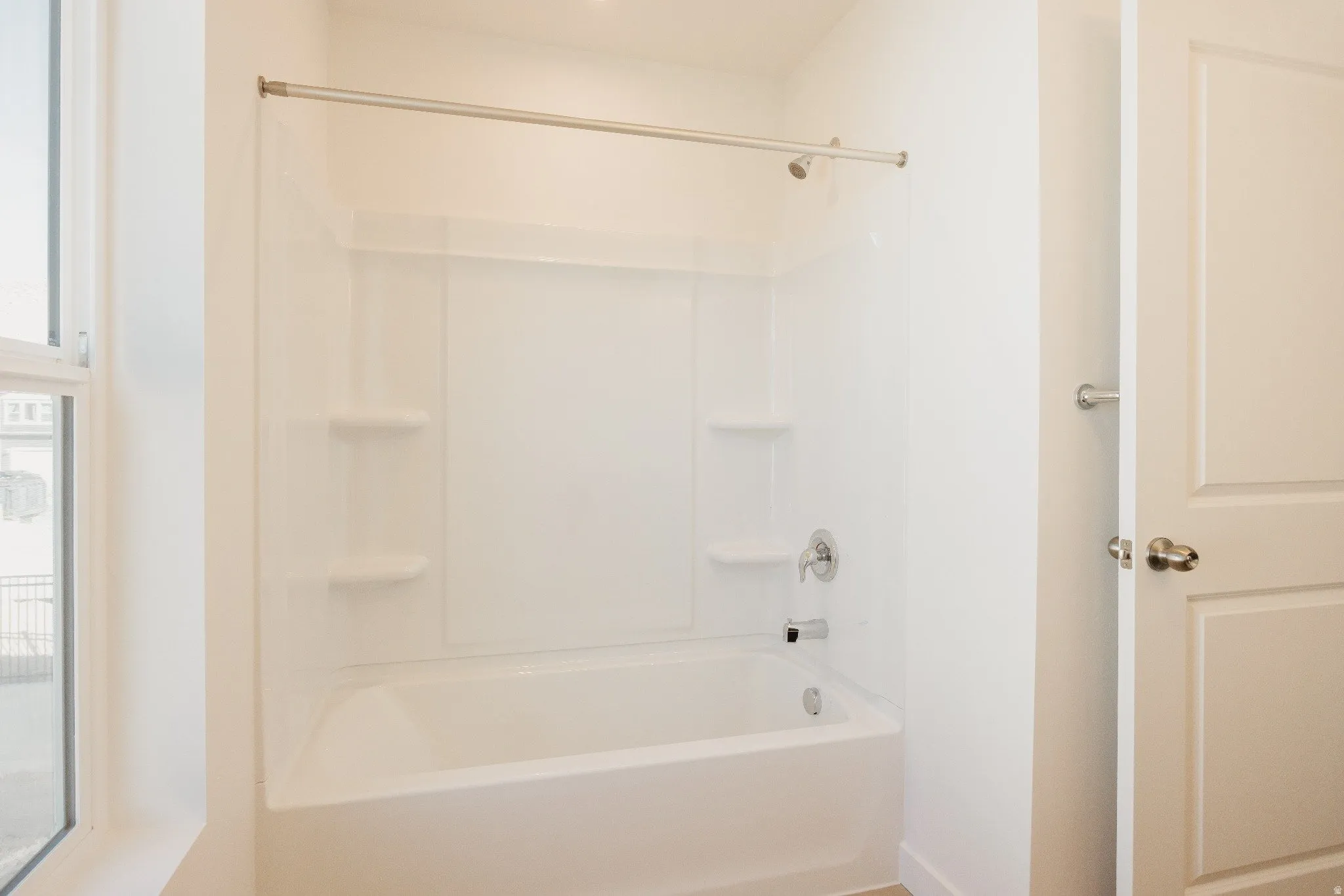 Bathroom featuring shower / bathtub combination