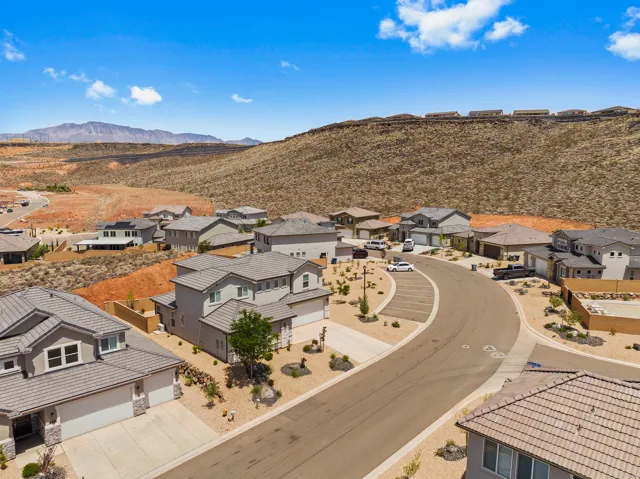 Aerial view of residential area with a mountainous background