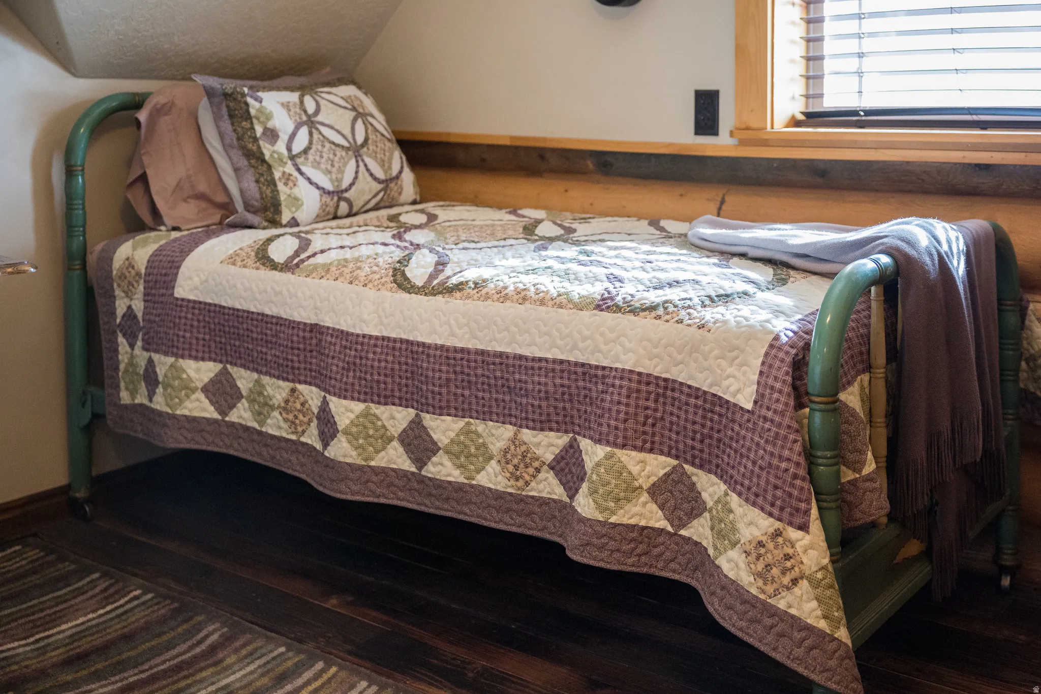 Bedroom featuring vaulted ceiling