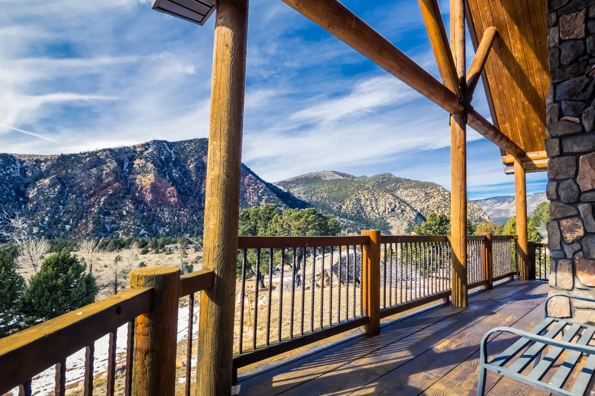 Wooden deck featuring a mountain view