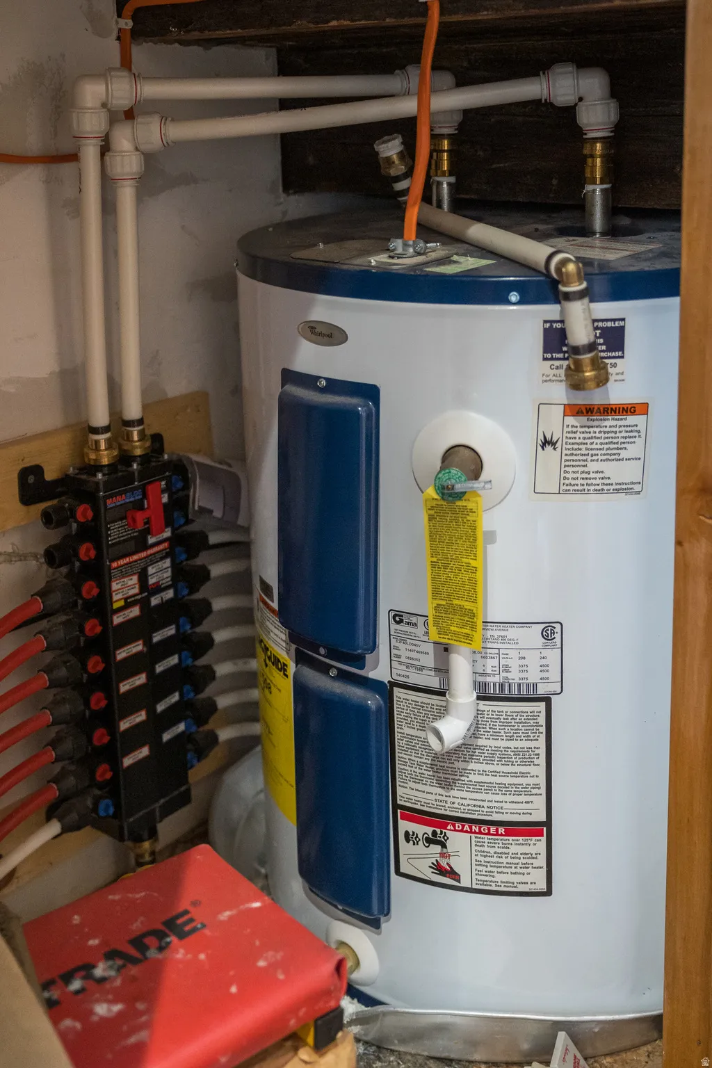 Utility room with electric water heater