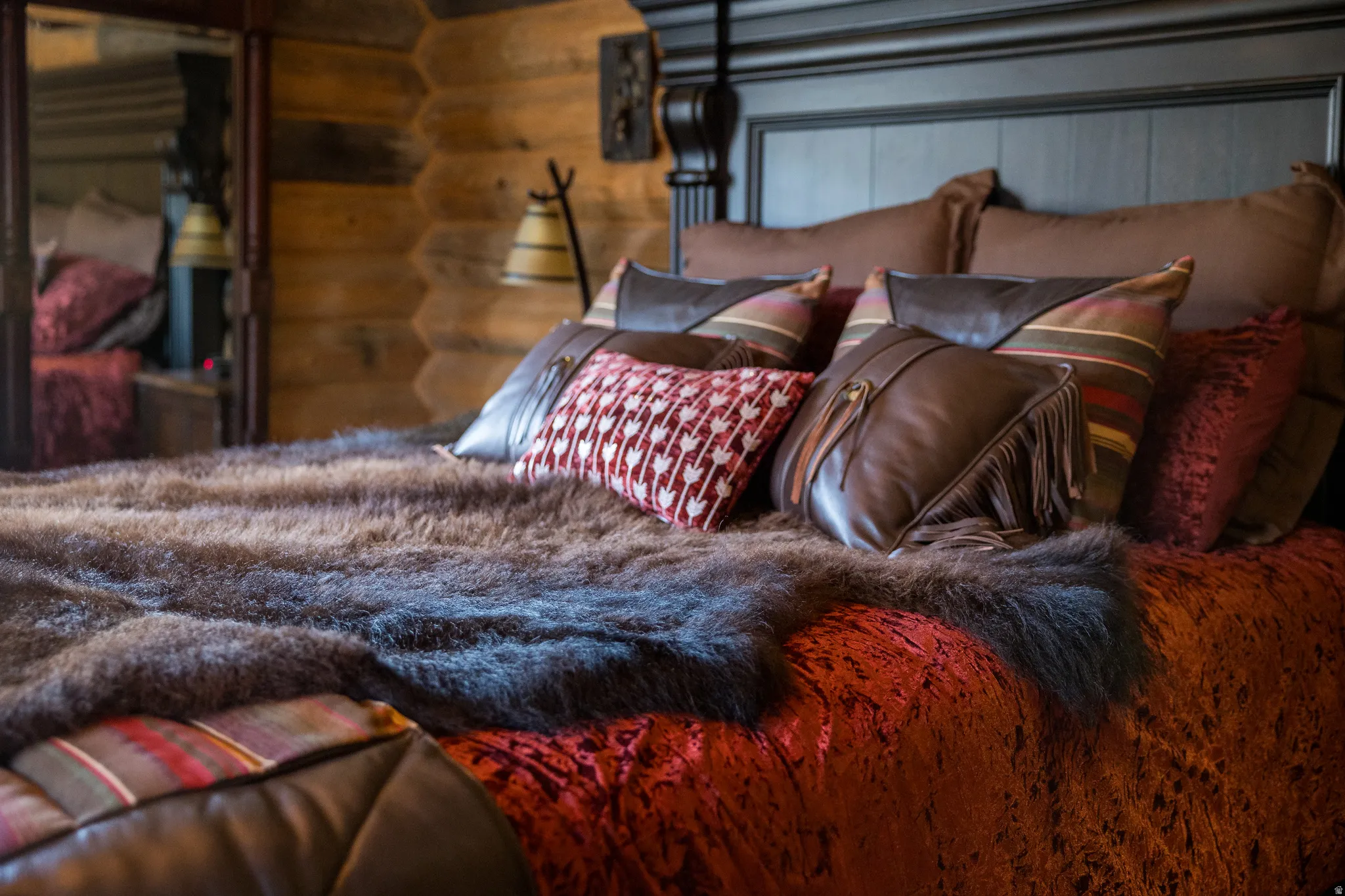 Bedroom featuring rustic walls