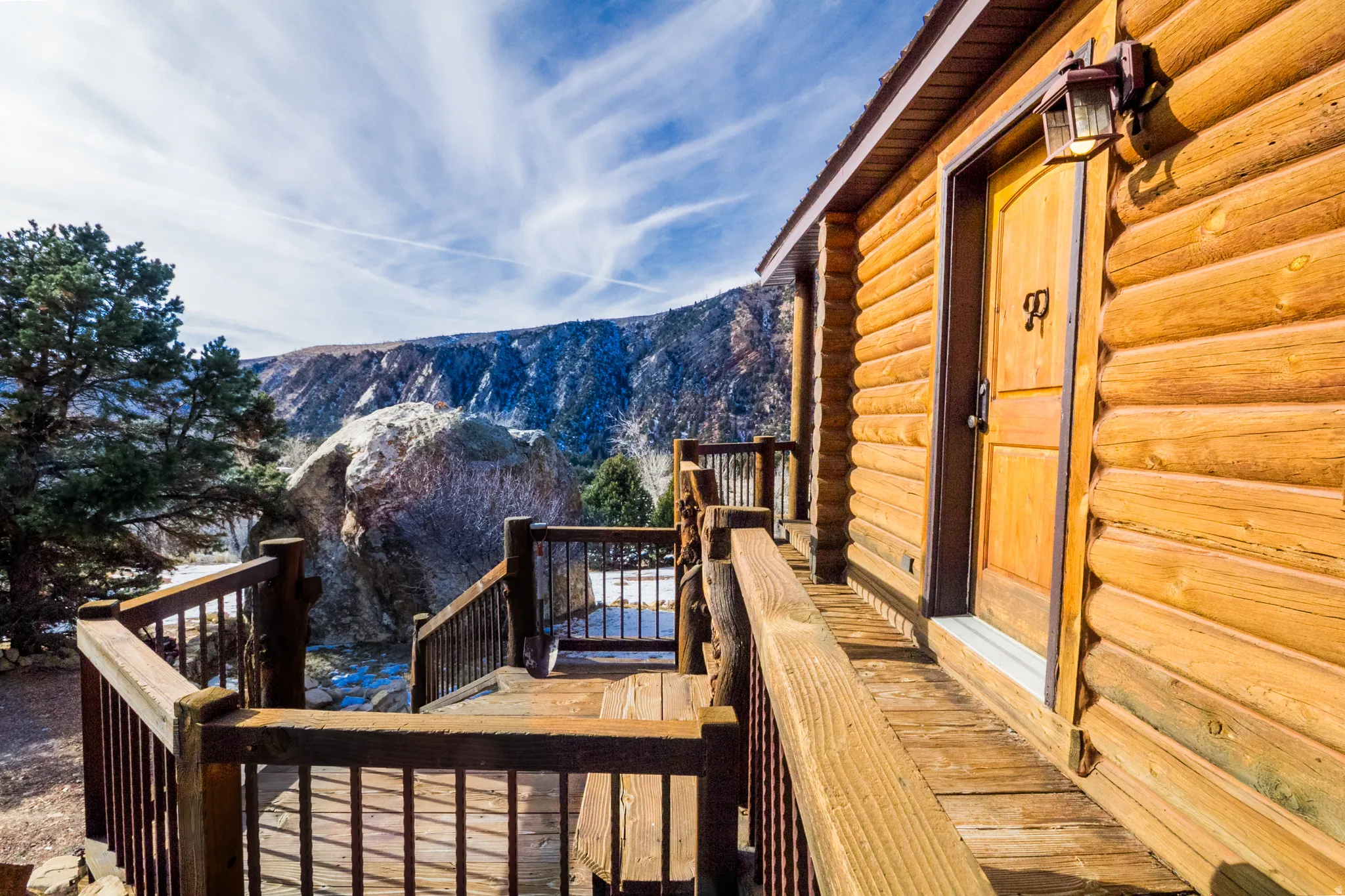 Wooden terrace with a mountain view and stairs