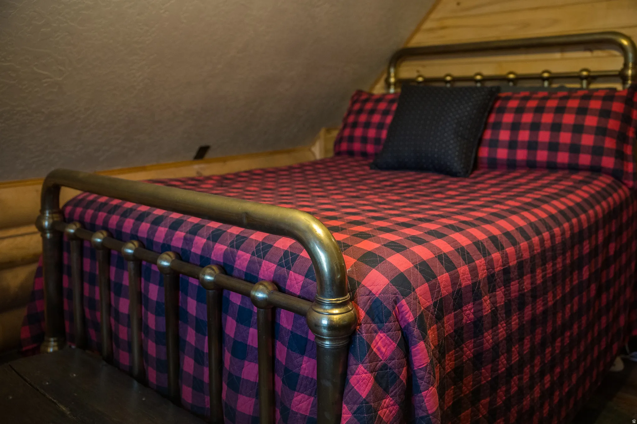 Bedroom with vaulted ceiling