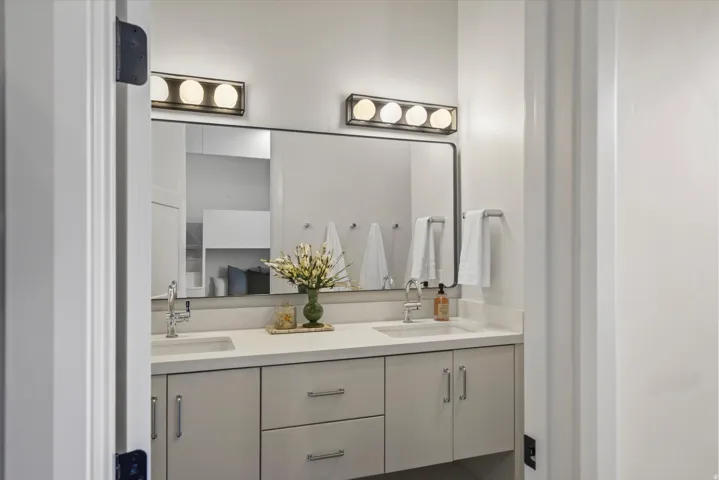 Full bathroom featuring double vanity