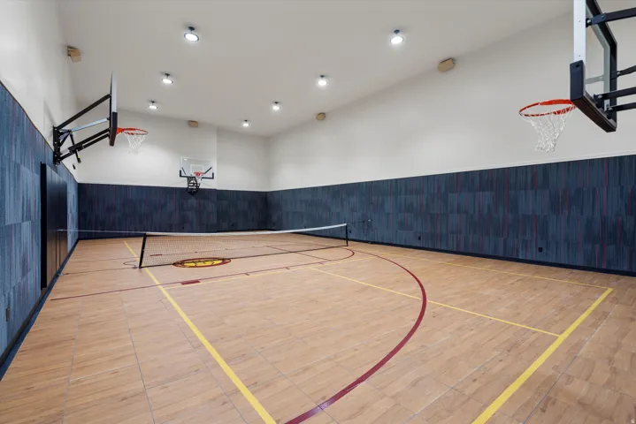 View of sport court featuring basketball court