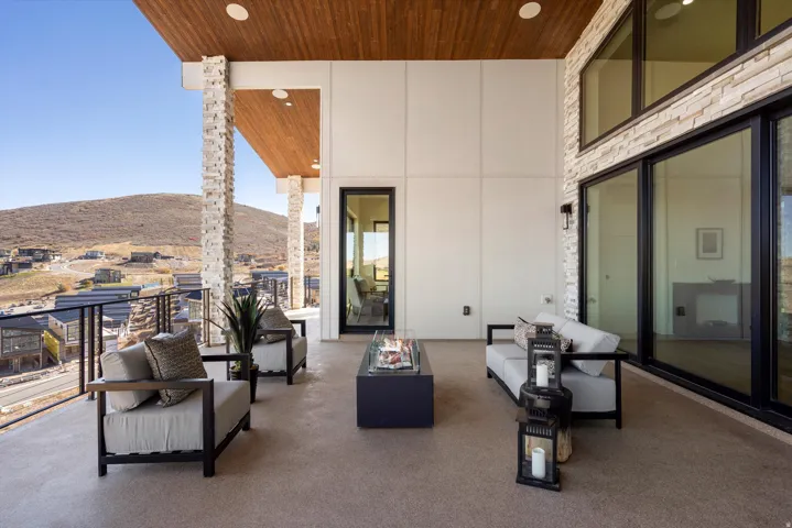 View of patio with a mountain view and outdoor seating