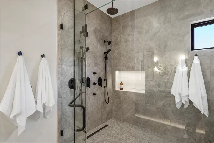 Full bath with a shower stall