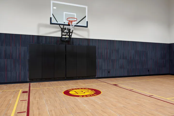 View of basketball court with basketball hoop