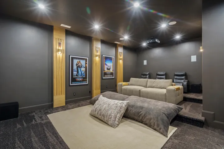 Home theater room with carpet flooring and recessed lighting