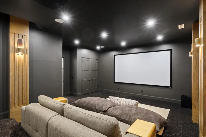 Home theater room featuring carpet and recessed lighting