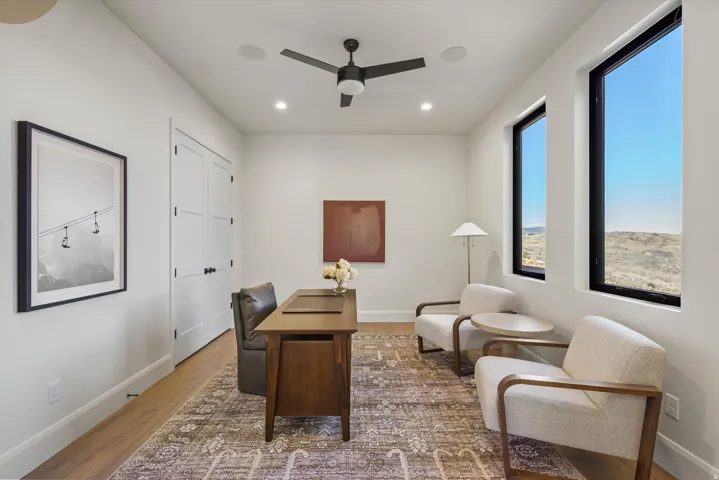 Home office featuring ceiling fan, wood finished floors, and recessed lighting