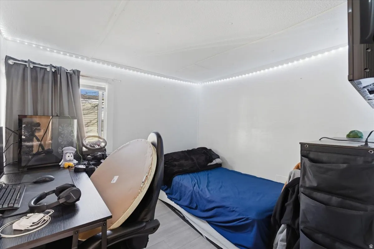 Bedroom featuring an office area