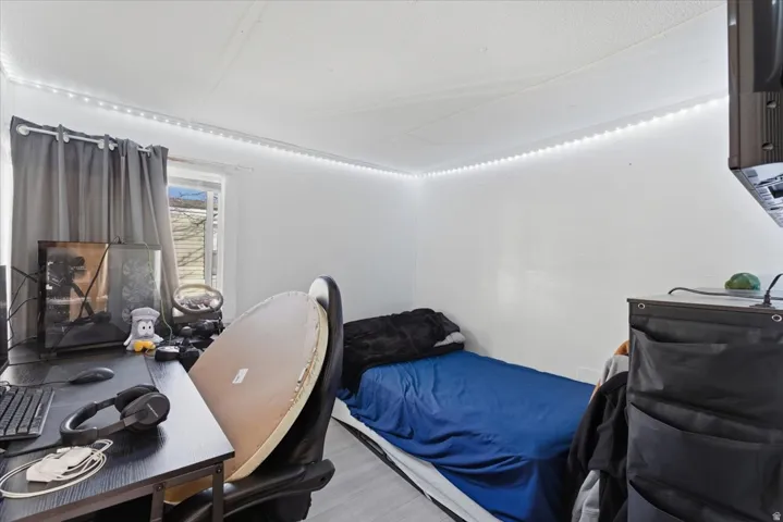 Bedroom featuring an office area