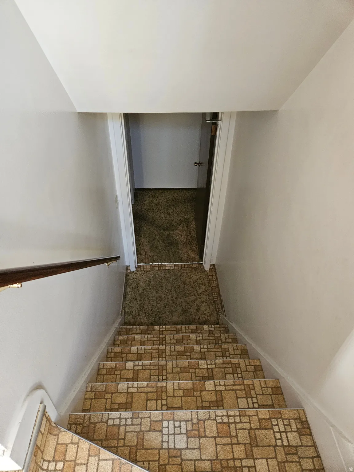 Stairway featuring baseboards