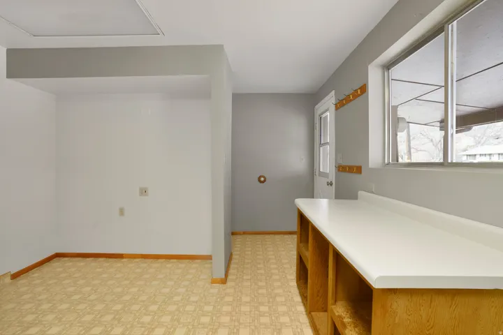 Bathroom featuring light flooring and vanity