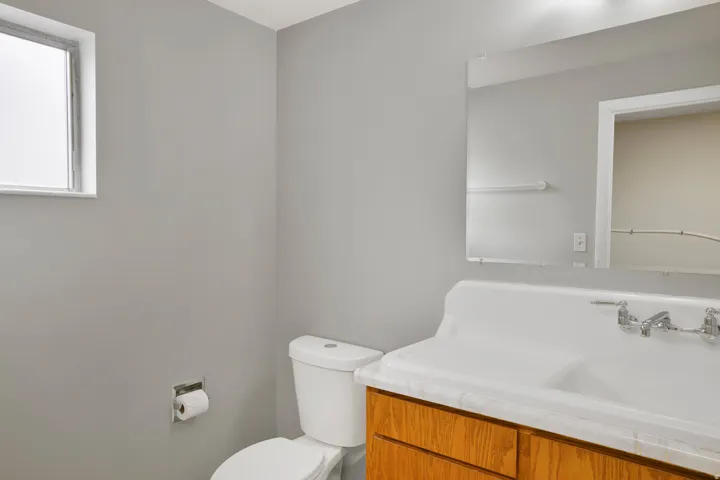 Bathroom with vanity and toilet