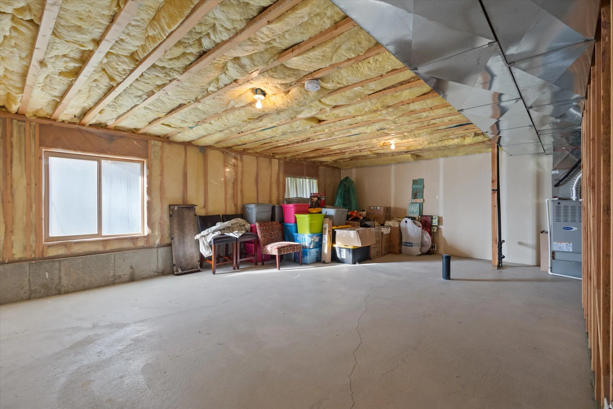 Basement featuring healthy amount of natural light