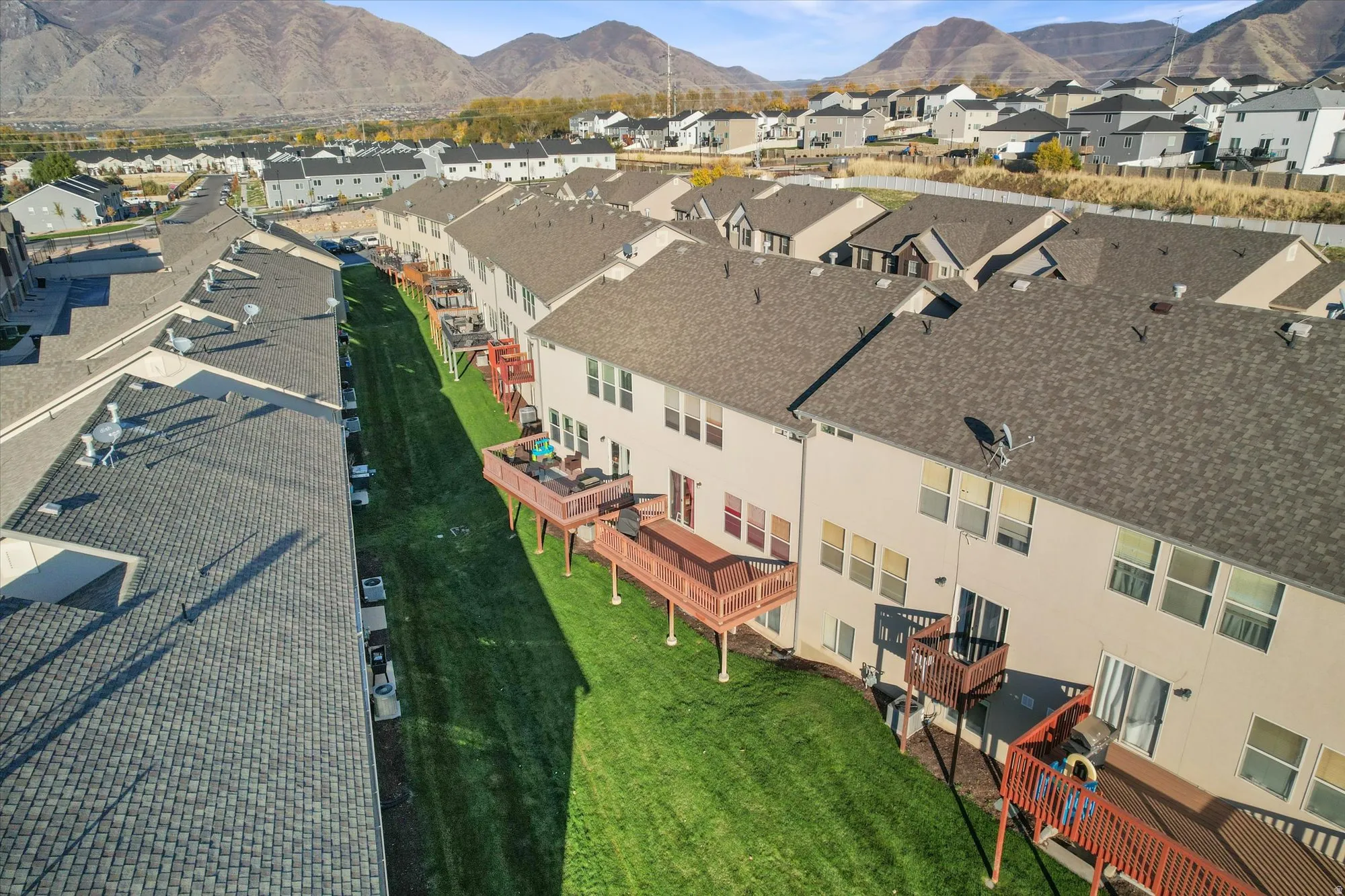 Aerial view of residential area with mountains