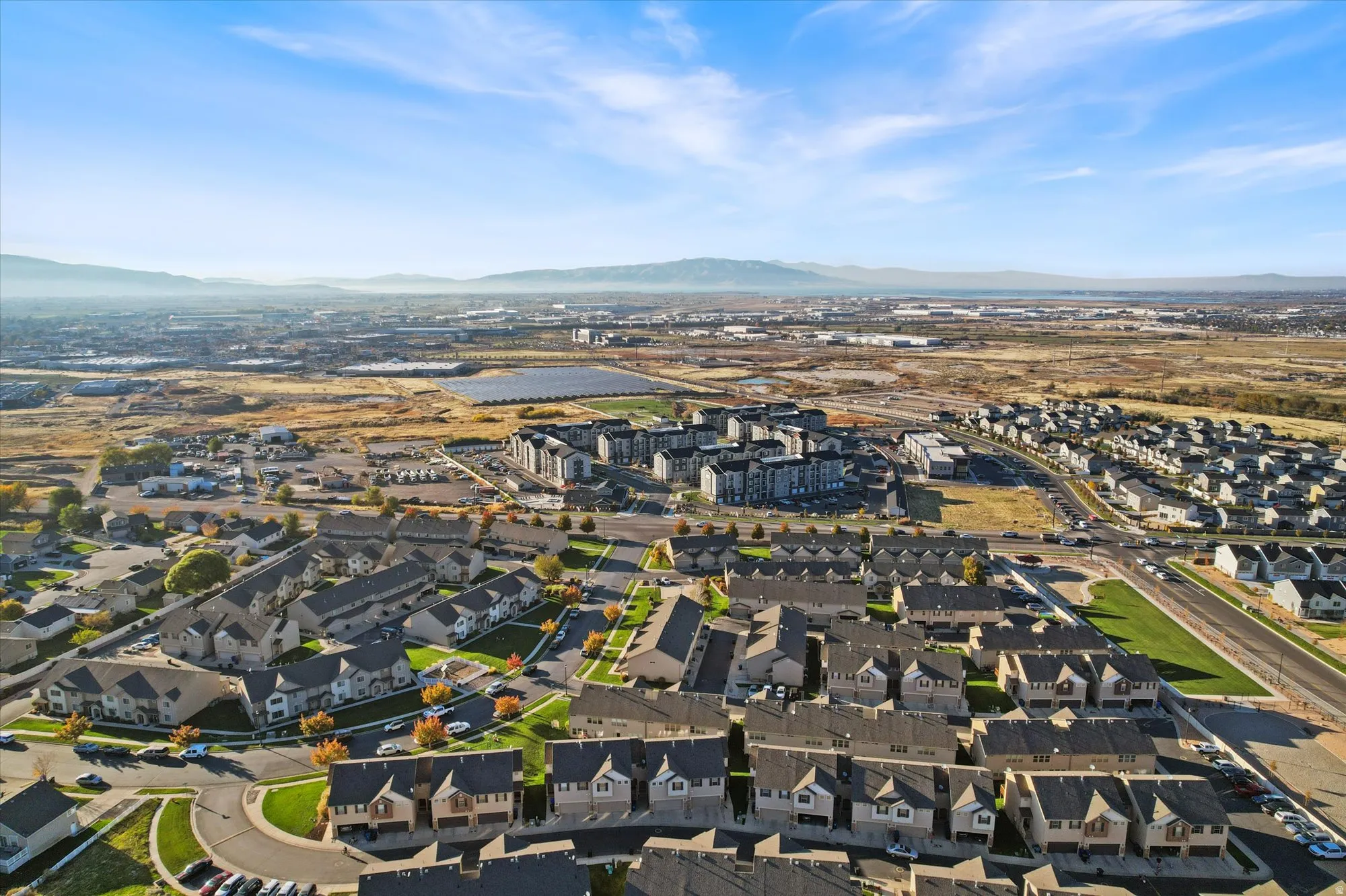 Aerial view of residential area with a mountainous background