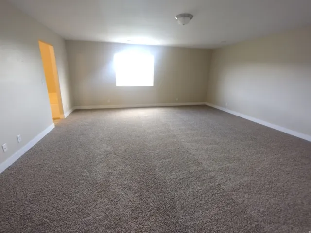 massive main bedroom with entry to private bath and closet