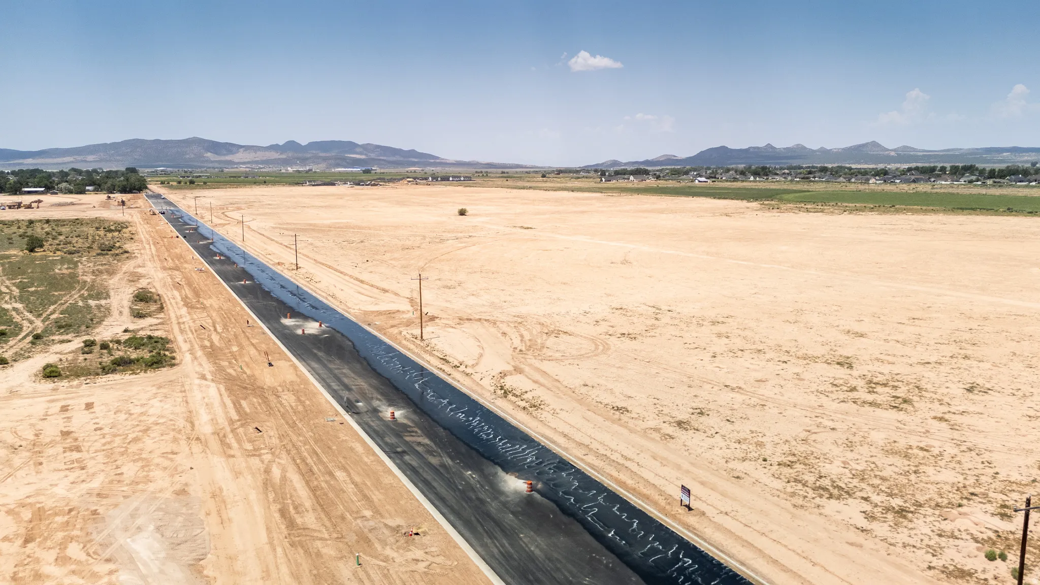 View of mountain backdrop featuring rural landscape