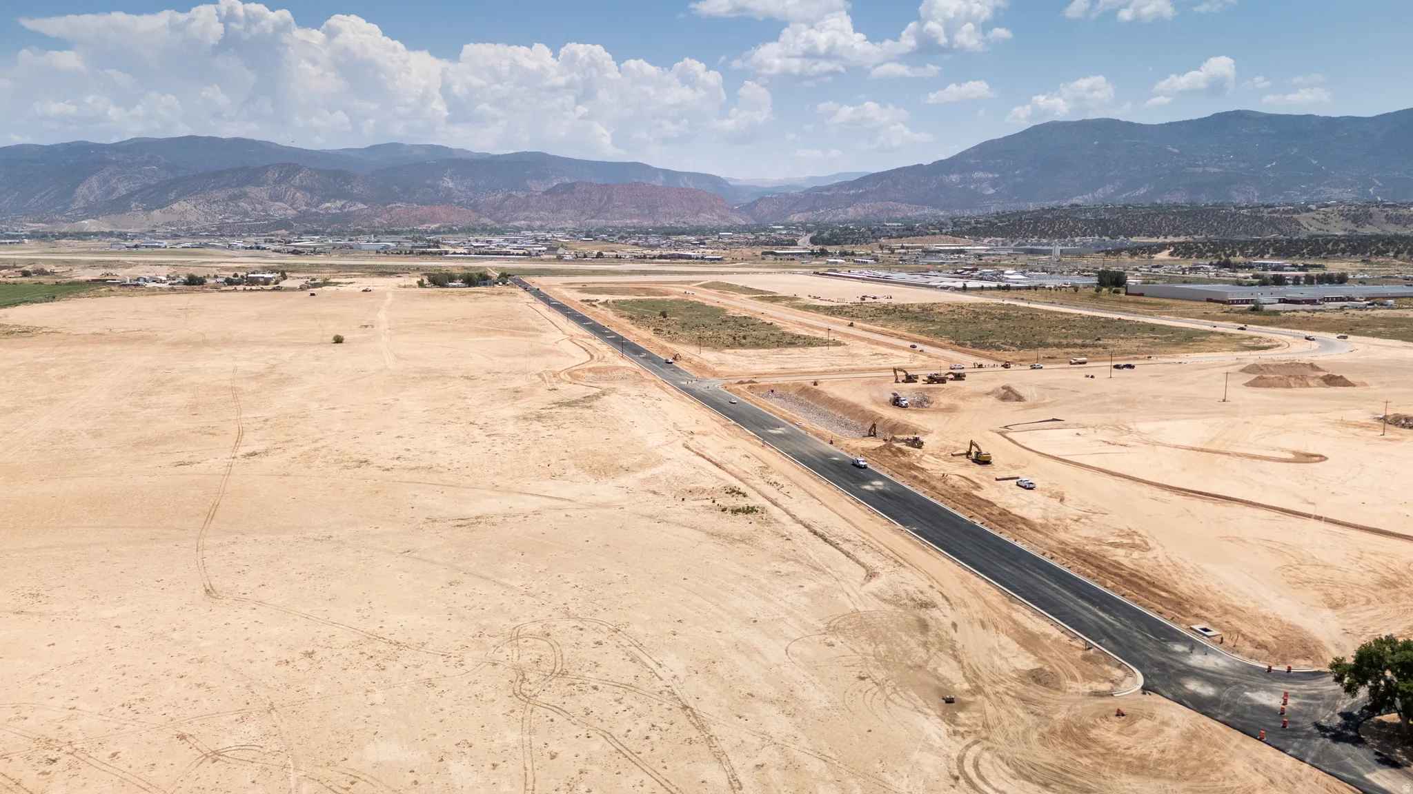 View of rural area with a mountain backdrop