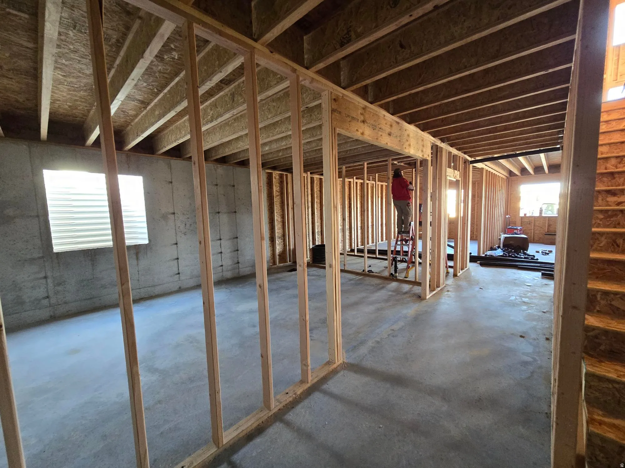 Miscellaneous room featuring concrete flooring
