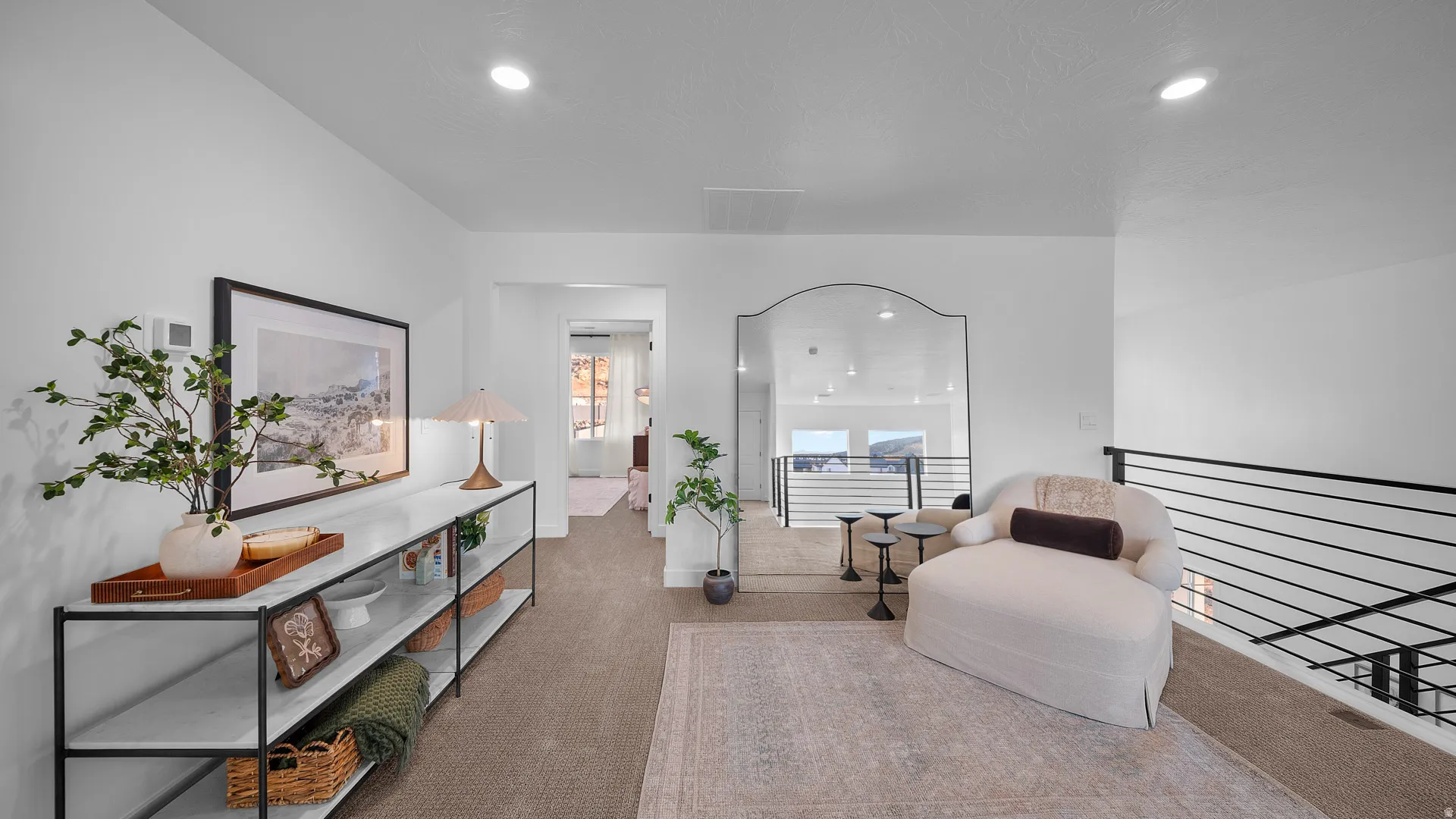 Sitting room with carpet flooring and recessed lighting