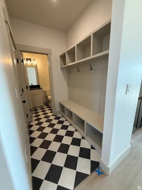 Mudroom with light floors