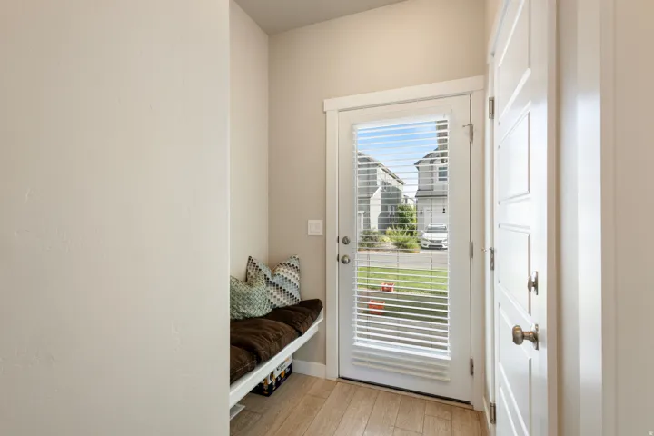 Doorway to outside featuring wood finished floors