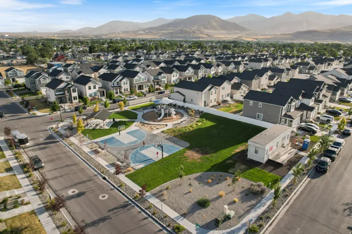 Aerial view of residential area with a mountain backdrop