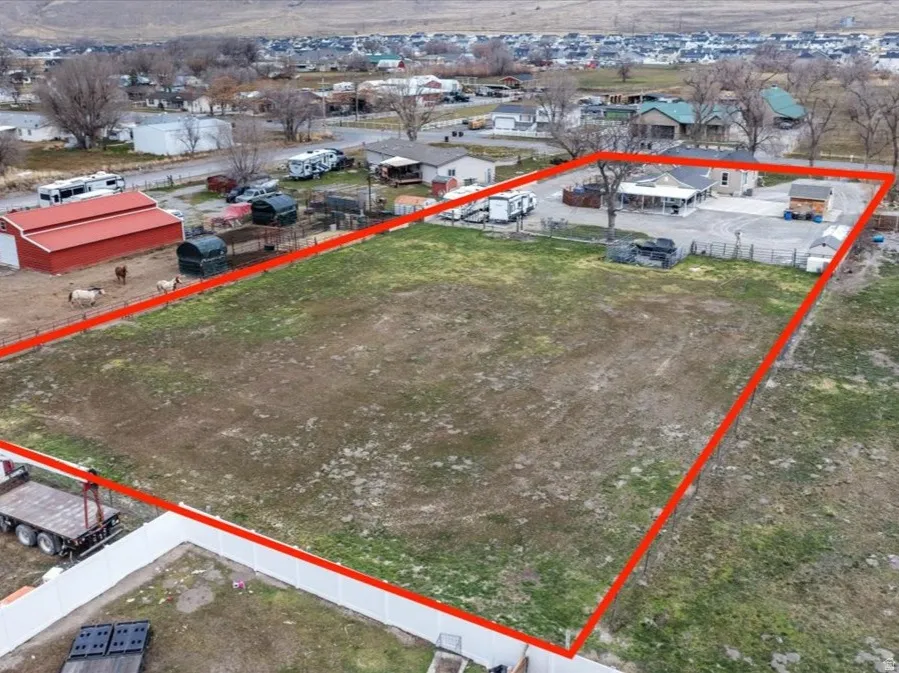 Aerial overview of property's location with property parcel outlined