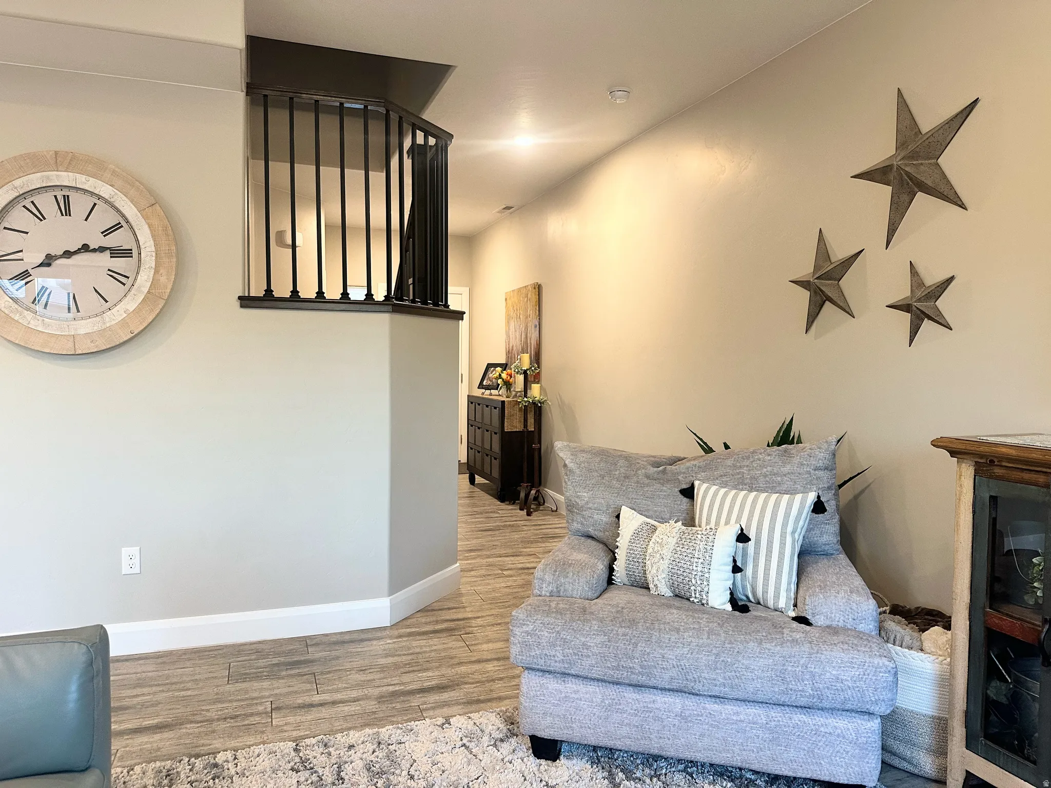Living area featuring wood finished floors and baseboards