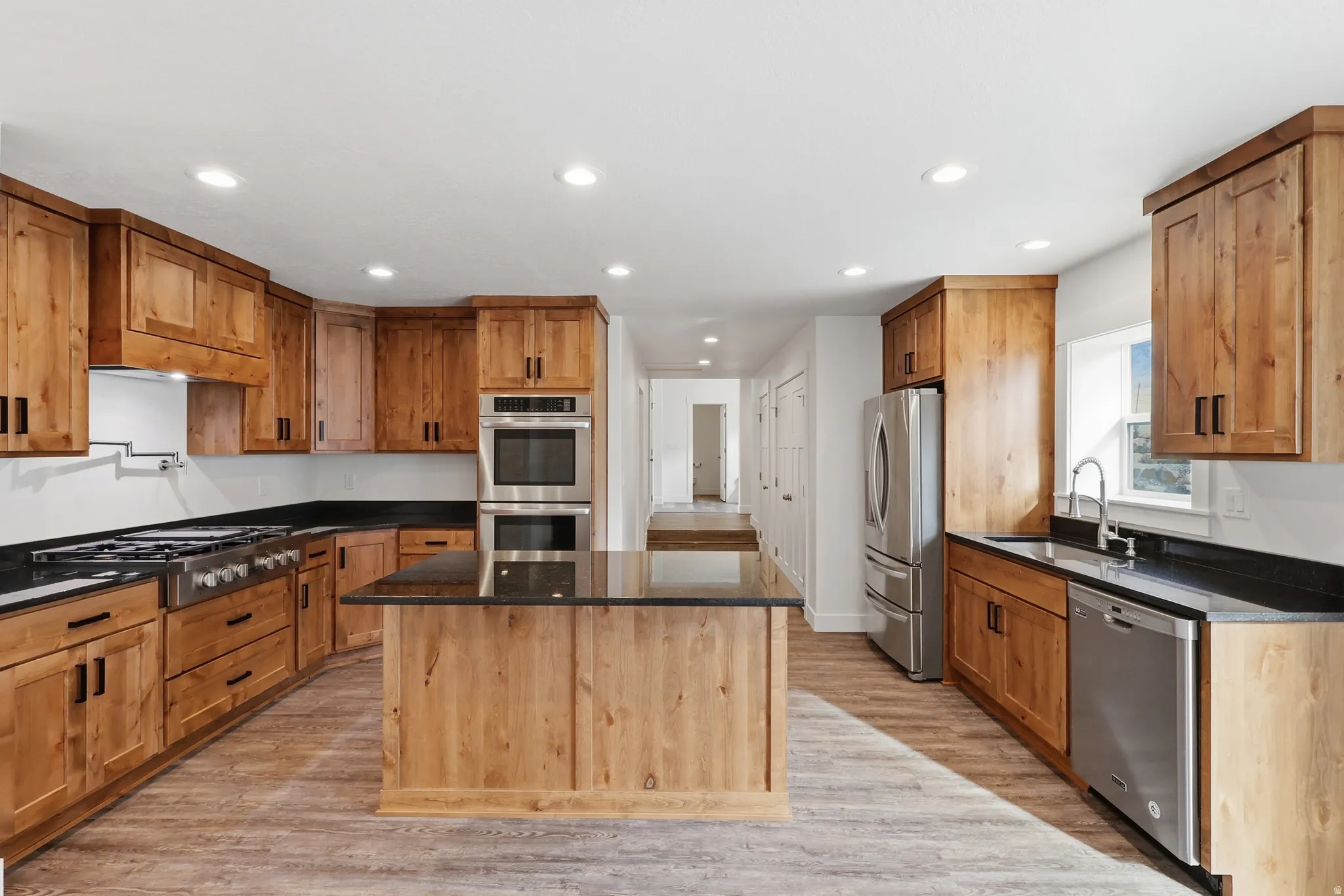 Kitchen featuring granite countertops and stainless steel appliances